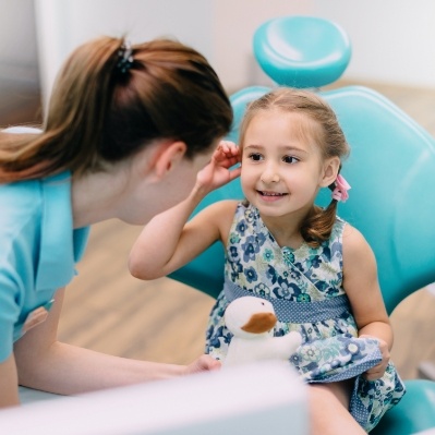 Young patient smiling during children's dentistry visit